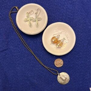 Radiant Silver cross earrings, glass with gold earrings, and initial necklace